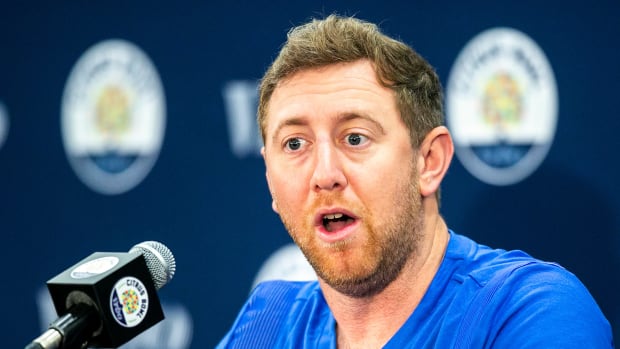 Kentucky offensive coordinator Liam Coen speaks during a news conference for the Vrbo Citrus Bowl, Wednesday, Dec. 29, 2021, at the Rosen Plaza Hotel in Orlando, Fla.